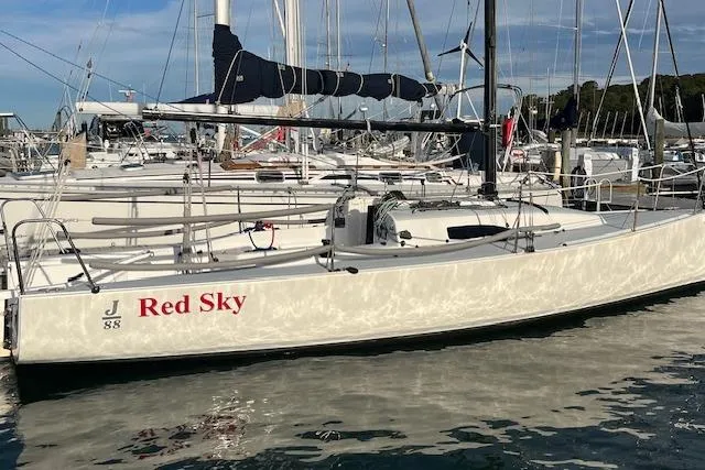 Slide: The Image of 2017 J Boats J/88 sailboat "Red Sky" docked in a marina. - 8