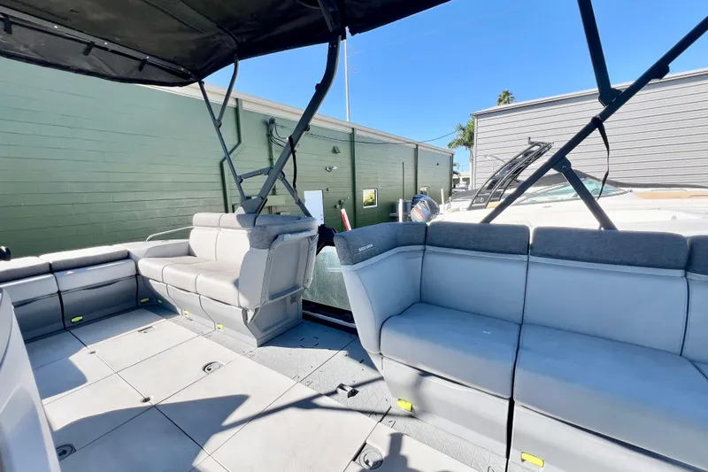 Slide: The Image of 2023 Sea-Doo Switch Cruise 21 interior with spacious seating and canopy. - 20