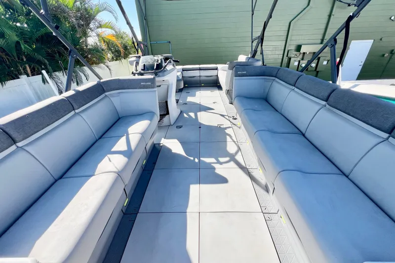 Slide: The Image of 2023 Sea-Doo Switch Cruise 21 interior with spacious seating and modern design. - 21