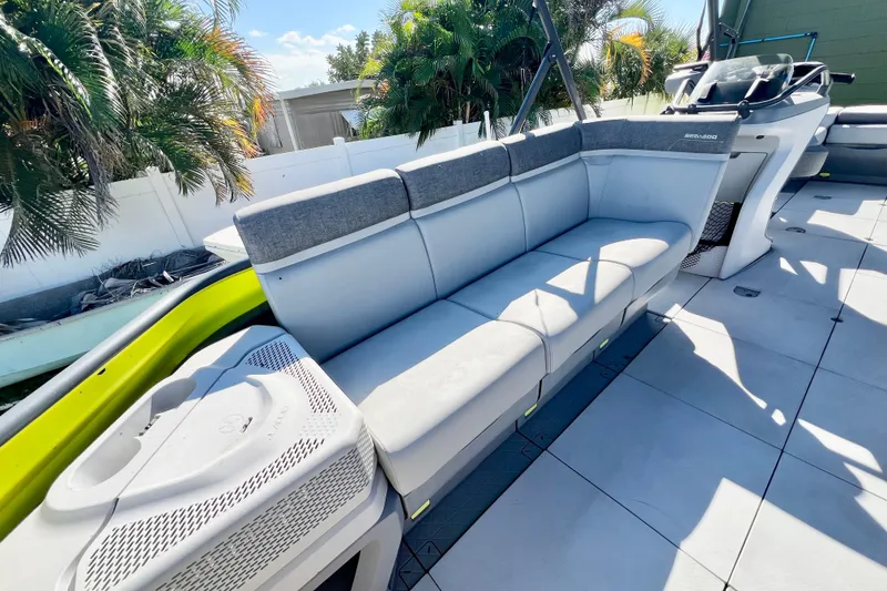 Slide: The Image of 2023 Sea-Doo Switch Cruise 21 interior with spacious seating and modern design. - 22