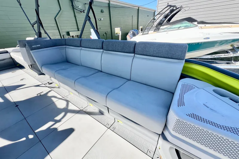 Slide: The Image of 2023 Sea-Doo Switch Cruise 21 boat interior with spacious seating and modern design. - 23