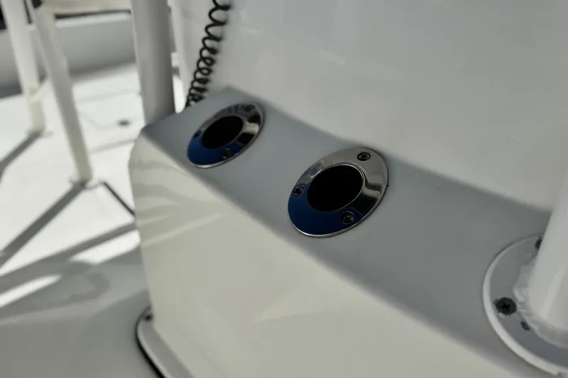 Slide: The Image of Close-up of Clearwater 2000 C/C 2021 boat rod holders on deck. - 21