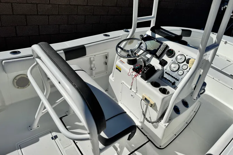 Slide: The Image of 2021 Clearwater 2000 C/C boat console with steering wheel and gauges. - 25