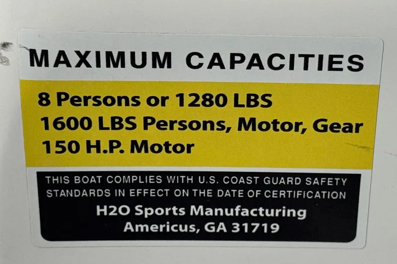 Slide: The Image of Clearwater 2000 C/C 2021 boat capacity label: 8 persons, 1280 lbs, 150 HP motor. - 31