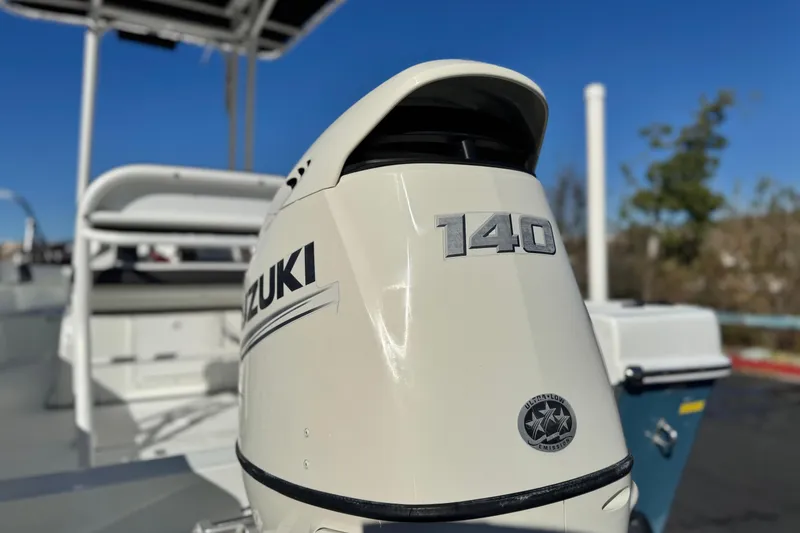 Slide: The Image of Clearwater 2000 C/C 2021 boat with Suzuki 140 outboard motor, sunny day. - 8