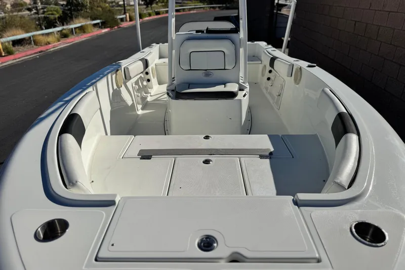 Slide: The Image of Clearwater 2000 C/C 2021 boat interior with seating and storage compartments. - 9