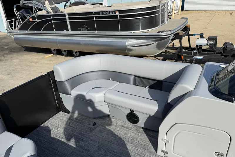 Slide: The Image of 2026 Bentley Pontoons Legacy 243 Swingback interior with sleek seating and modern design. - 16