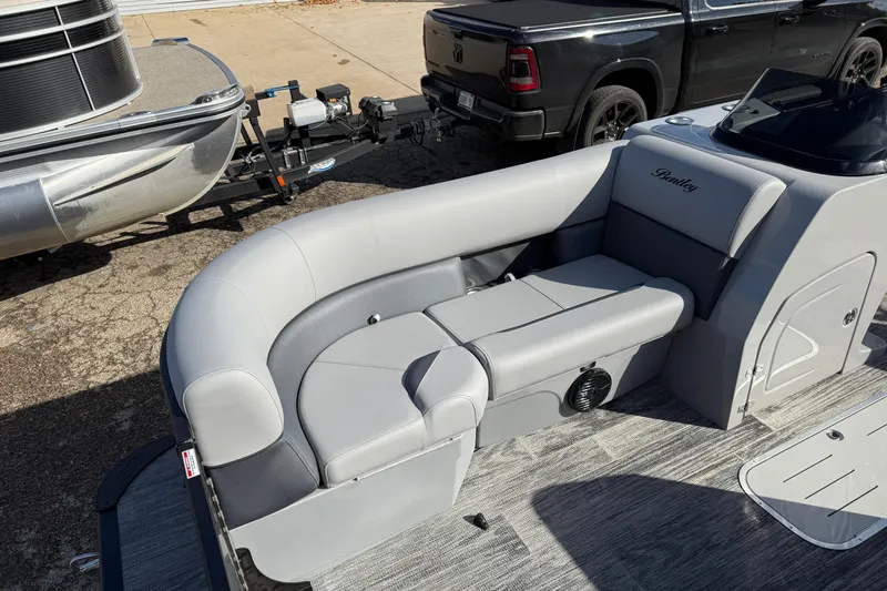 Slide: The Image of 2026 Bentley Pontoons Legacy 243 Swingback with luxurious seating and modern design. - 19