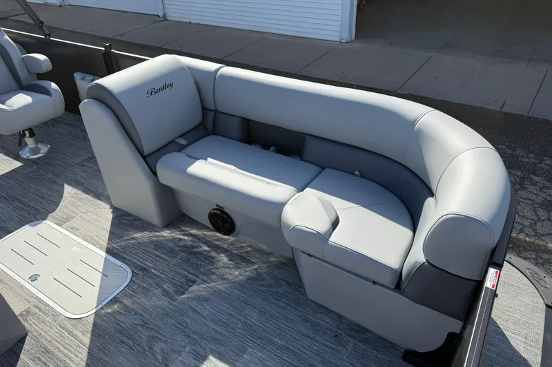 Slide: The Image of 2026 Bentley Pontoons Legacy 243 Swingback with luxurious gray seating and modern design. - 20