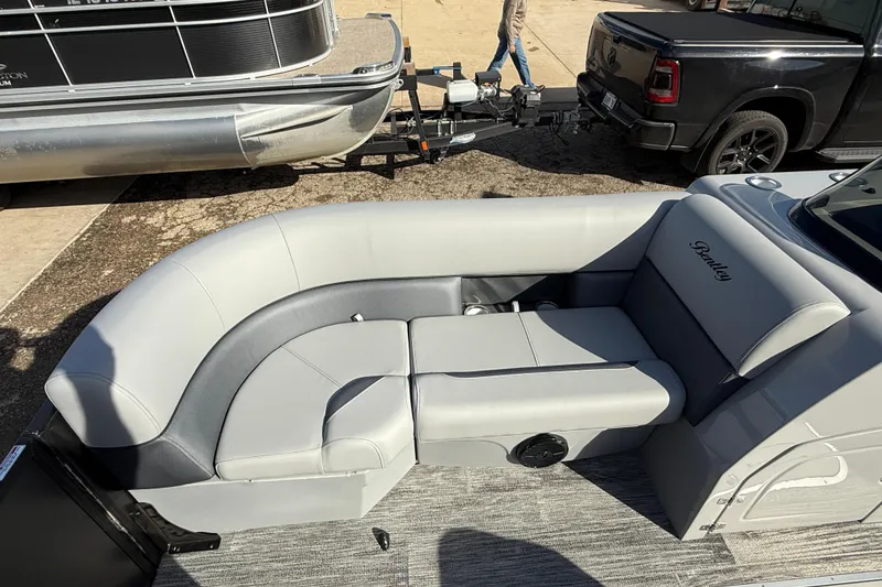 Slide: The Image of 2026 Bentley Pontoons Legacy 243 Swingback with luxurious seating and sleek design. - 21