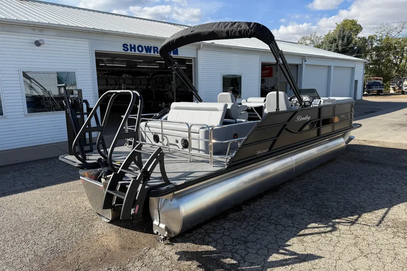 Slide: The Image of 2026 Bentley Pontoons Legacy 243 Swingback at showroom, featuring sleek design and modern amenities. - 4