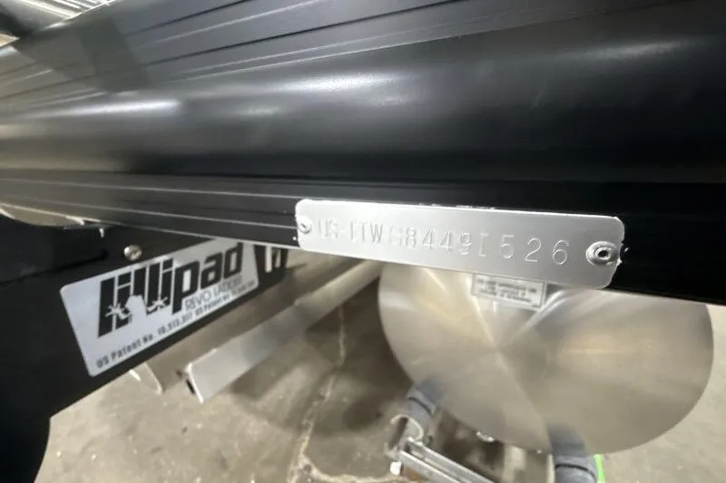 Slide: The Image of 2026 Bennington 24 MOFBSF boat with visible hull identification number plate. - 10