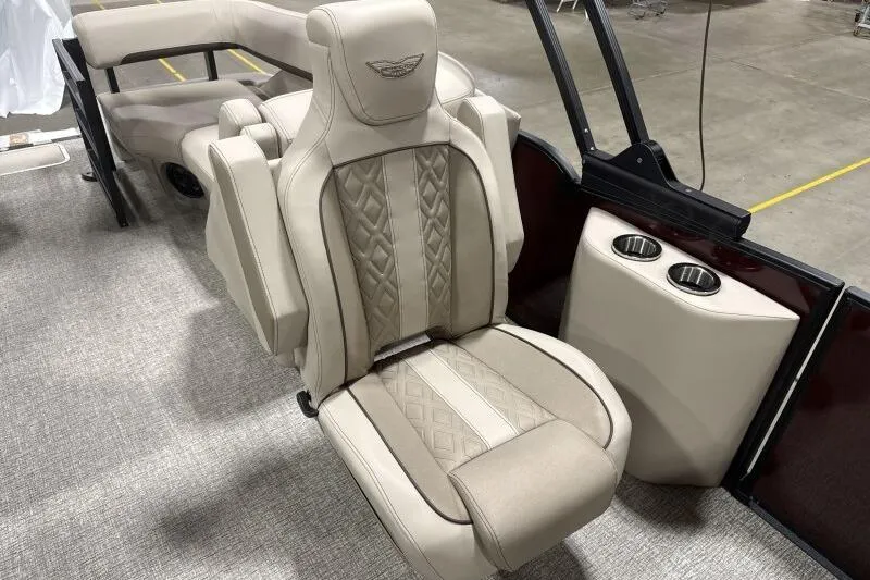 Slide: The Image of Luxurious seating in 2026 Bennington 24 MOFBSF boat with elegant beige upholstery. - 11