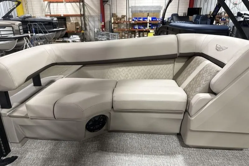 Slide: The Image of 2026 Bennington 24 MOFBSF boat interior with luxurious beige seating and elegant design. - 16