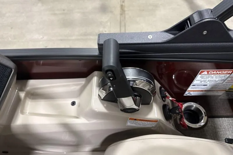 Slide: The Image of Control panel of 2026 Bennington 24 MOFBSF boat with throttle lever and warning labels. - 19