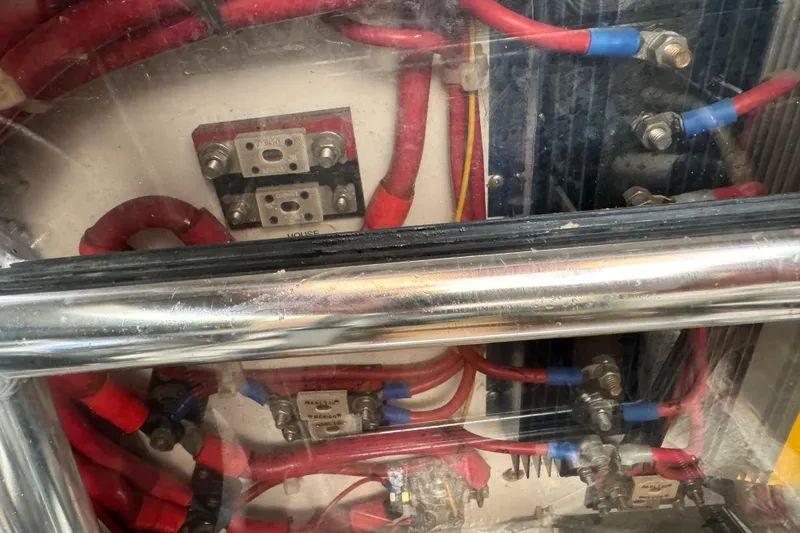 Slide: The Image of Electrical wiring and components inside a 2001 Legacy Yachts Express boat. - 89