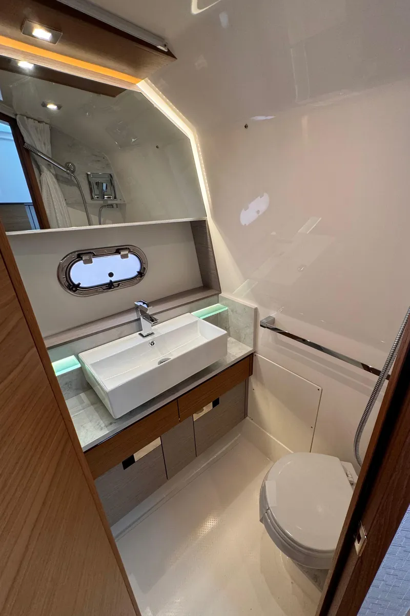 Slide: The Image of Luxurious bathroom in 2023 Tiara Yachts 38 LS, featuring modern sink and elegant design. - 14