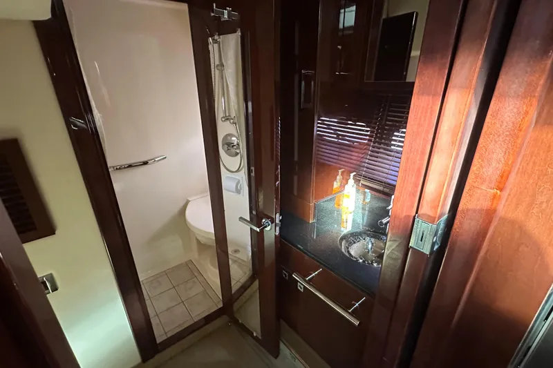 Slide: The Image of Luxurious bathroom interior of 2011 Sea Ray 470 Sundancer yacht with modern fixtures. - 11