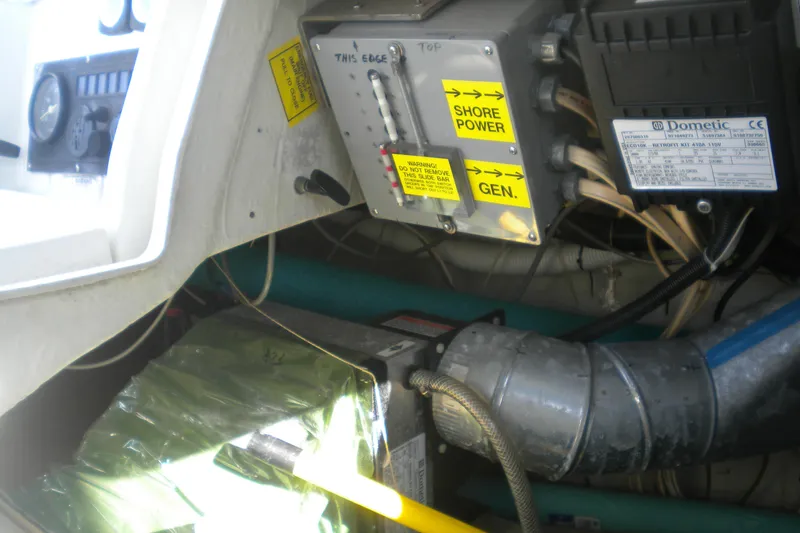 Slide: The Image of Electrical system and components inside a 1997 Beneteau Oceanis 321 sailboat. - 39