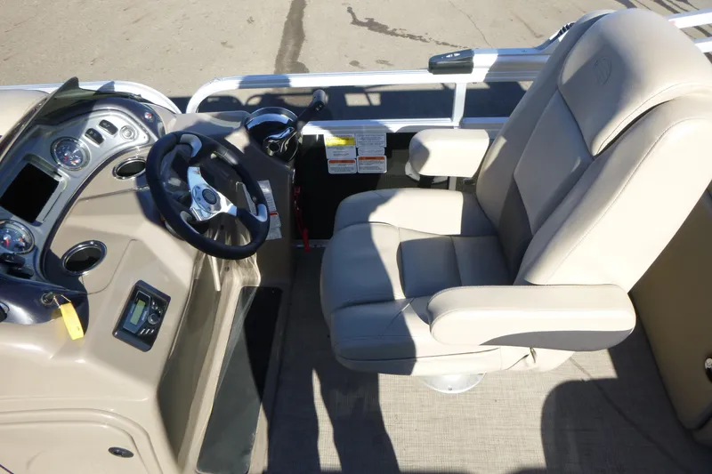 Slide: The Image of Captain's seat and helm of 2022 Sun Tracker Party Barge 22 DLX pontoon boat. - 10