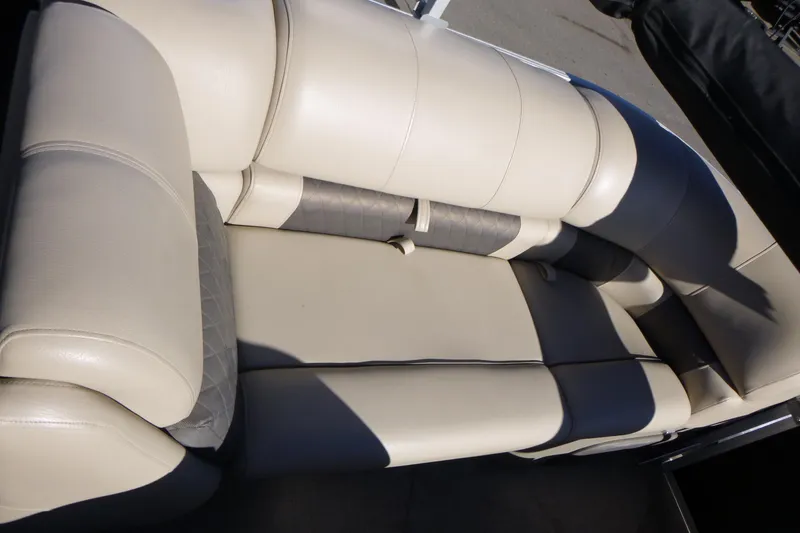 Slide: The Image of 2022 Sun Tracker Party Barge 22 DLX, beige and gray cushioned seating. - 12