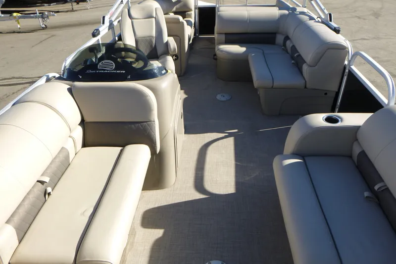 Slide: The Image of 2022 Sun Tracker Party Barge 22 DLX interior with spacious seating and modern design. - 5