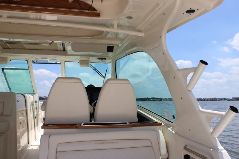 Slide: The Image of Interior of 2026 Grady-White Freedom 415 yacht overlooking the water. - 20