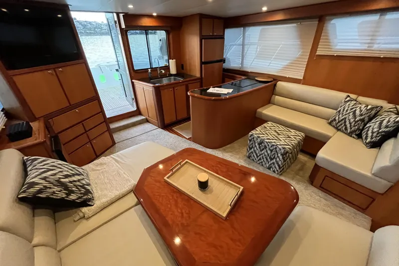 Slide: The Image of Luxurious interior of 2010 Mikelson 43 Sportfisher yacht with elegant wood finishes. - 10