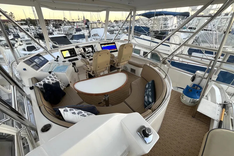 Slide: The Image of Luxurious 2010 Mikelson 43 Sportfisher yacht interior with helm and seating area. - 24