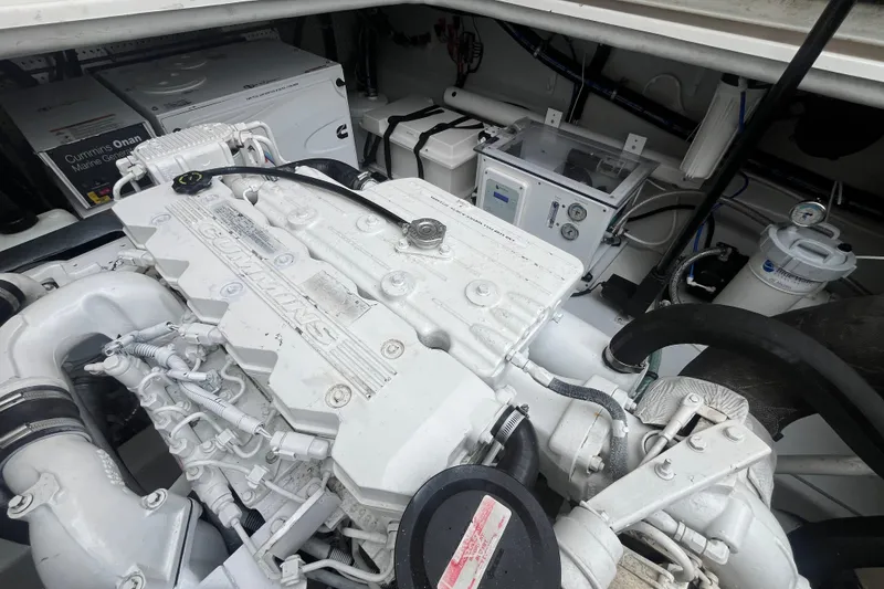 Slide: The Image of Engine room of 2010 Mikelson 43 Sportfisher with Cummins marine generator. - 47