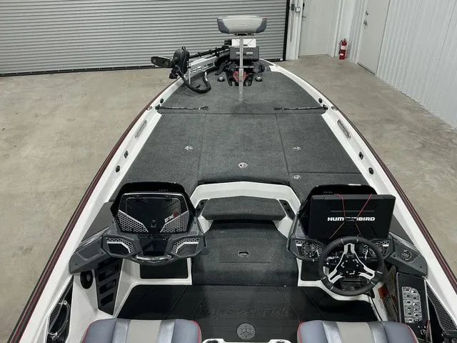 Slide: The Image of 2022 Skeeter FXR21 Apex boat interior with advanced navigation and fishing equipment. - 16