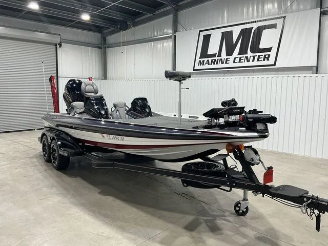 Slide: The Image of 2022 Skeeter FXR21 Apex boat in showroom, LMC Marine Center backdrop. - 3