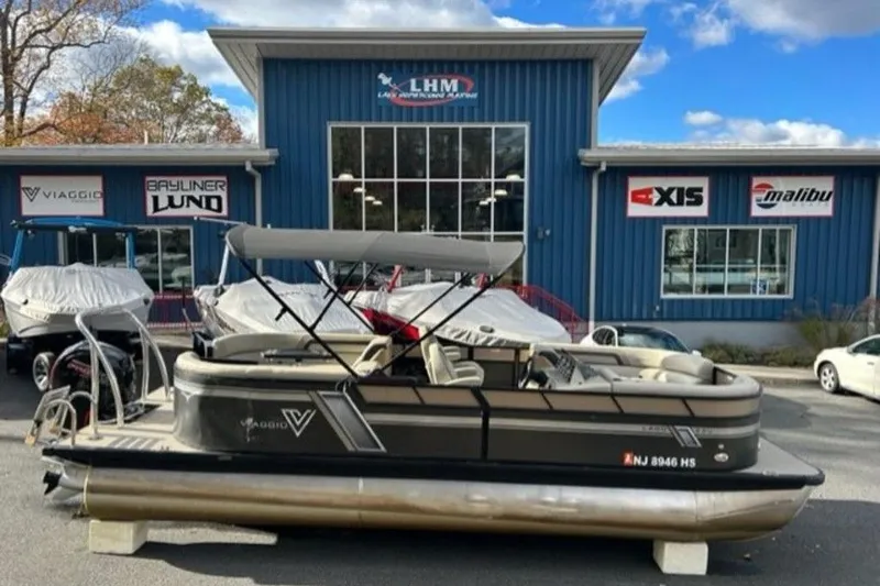 Slide: The Image of 2023 Viaggio L22U boat dashboard with steering wheel and control panel. - 7