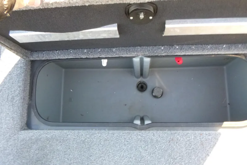 Slide: The Image of 2022 Ranger RT188P storage compartment, open and empty, with carpeted interior. - 12