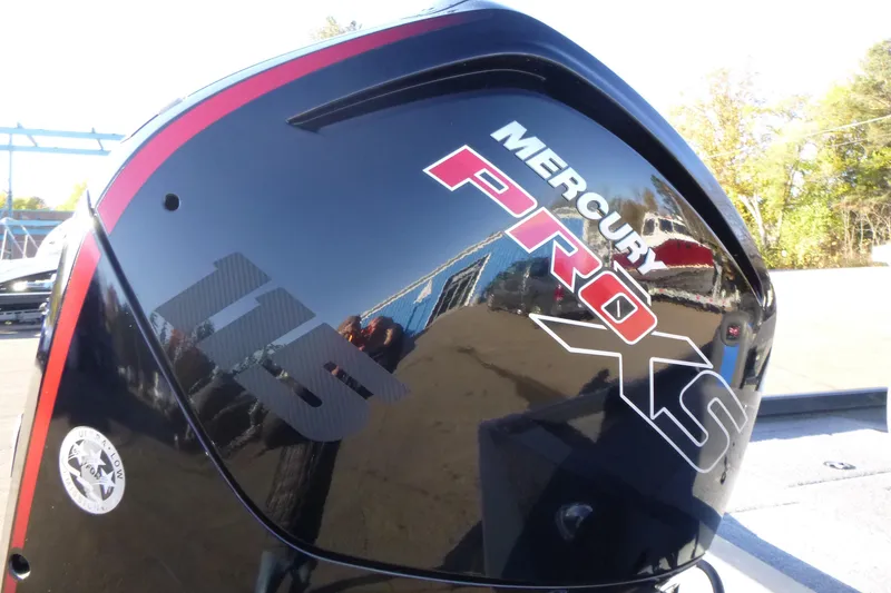 Slide: The Image of Mercury Pro XS outboard motor on 2022 Ranger RT188P boat, reflecting surroundings. - 13