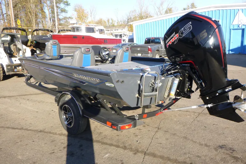 Slide: The Image of 2022 Ranger RT188P boat with Mercury Pro XS engine, parked outdoors. - 3