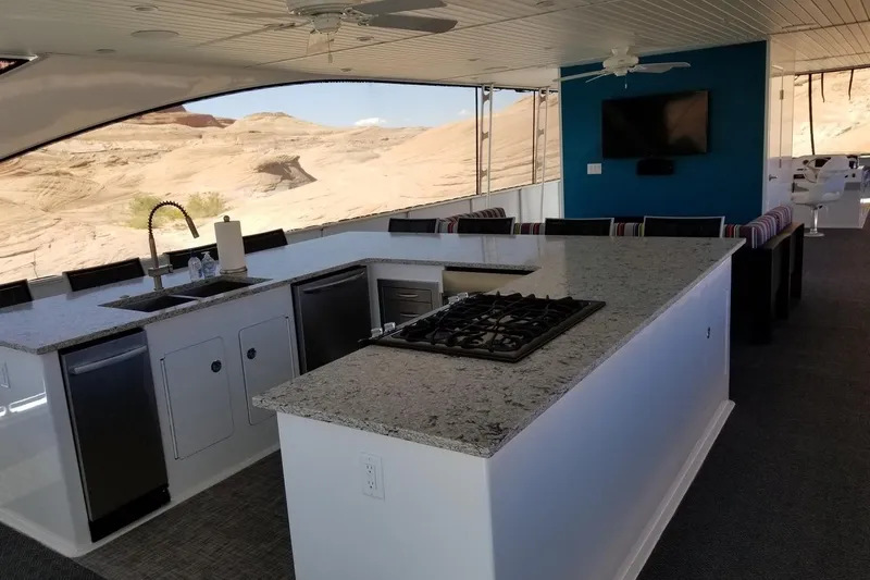 Slide: The Image of Luxurious Adonia 7518 houseboat kitchen with granite countertops and desert view, 2017 model. - 14