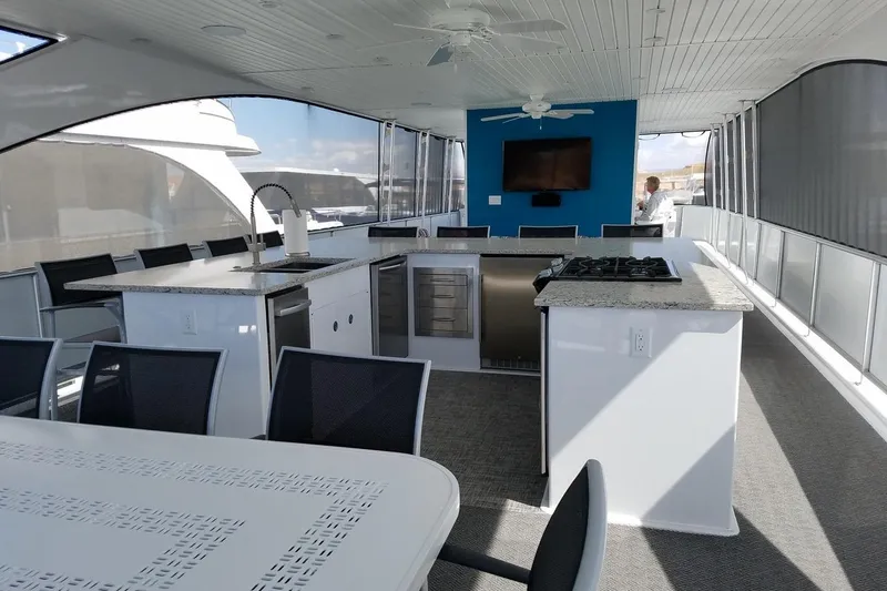 Slide: The Image of Luxurious Adonia 7518 yacht interior with modern kitchen and dining area, 2017 model. - 15