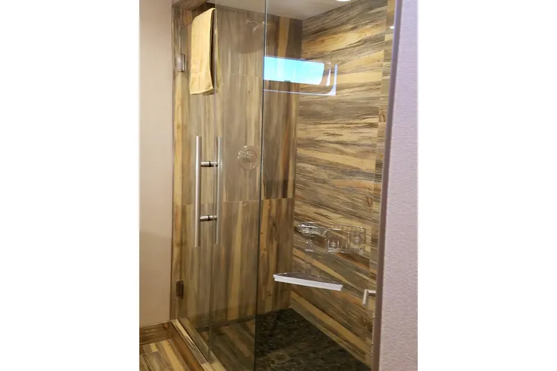 Slide: The Image of Modern glass shower with wood-patterned walls in Adonia 7518, 2017 model. - 2