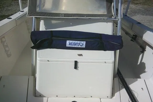 Slide: The Image of 2002 KenCraft Challenger 235 CC boat interior with storage compartment and cover. - 22