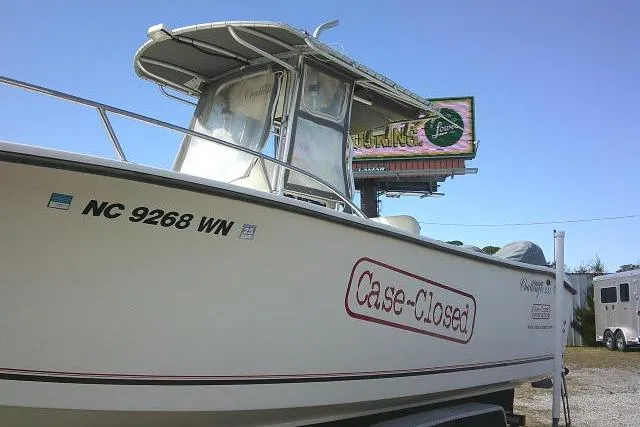 Slide: The Image of 2002 KenCraft Challenger 235 CC boat named "Case-Closed" with registration NC 9268 WN. - 3
