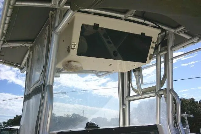 Slide: The Image of 2002 KenCraft Challenger 235 CC boat console with overhead electronics box. - 30