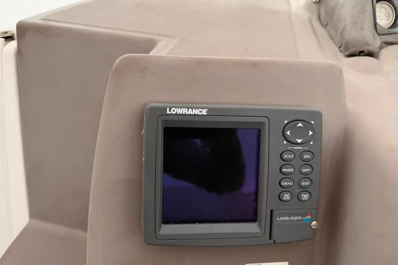 Slide: The Image of Lowrance LMS-525C GPS unit on 2005 Regal Commodore 265 boat dashboard. - 27
