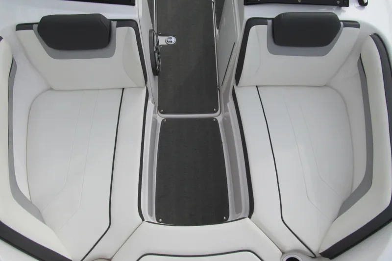 Slide: The Image of 2016 Yamaha Boats AR192 interior seating with sleek white and black design. - 11