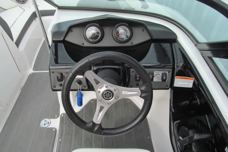 Slide: The Image of 2016 Yamaha Boats AR192 dashboard with steering wheel and instrument panel. - 6