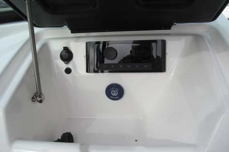 Slide: The Image of 2016 Yamaha Boats AR192 dashboard with Fusion audio system and controls. - 8