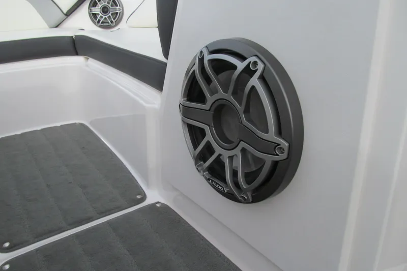 Slide: The Image of Speaker system on 2016 Yamaha Boats AR192, featuring JL Audio, with cushioned seating. - 9