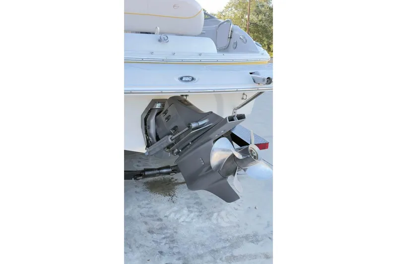 Slide: The Image of Rear view of 2005 Crownline 220 EX boat with visible propeller and outdrive. - 11