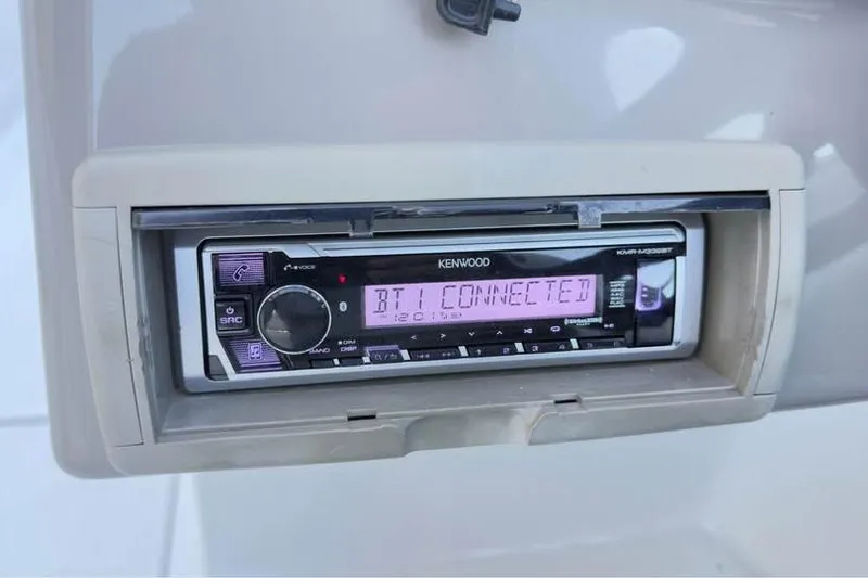 Slide: The Image of Kenwood stereo system in 2005 Crownline 220 EX boat, displaying "BT1 CONNECTED". - 7