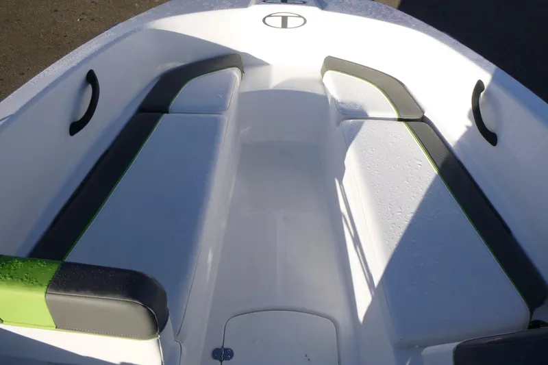Slide: The Image of 2024 Tahoe T16 boat interior with sleek seating and modern design. - 7